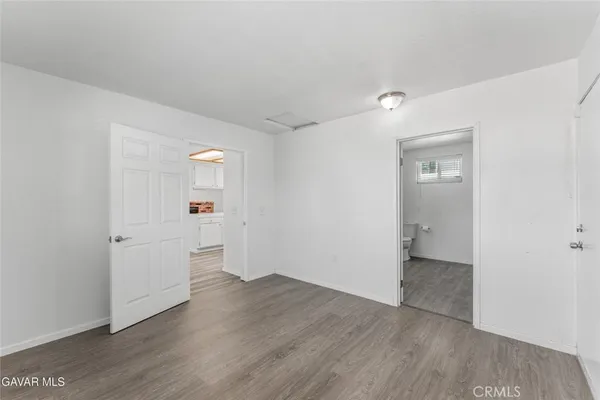a bathroom with a sink and vanity