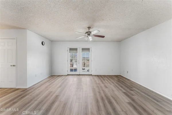 a view of an empty room and window