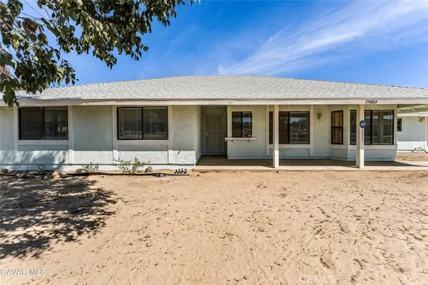 a view of a house with a patio