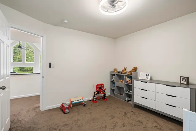 a bathroom with a sink vanity and mirror