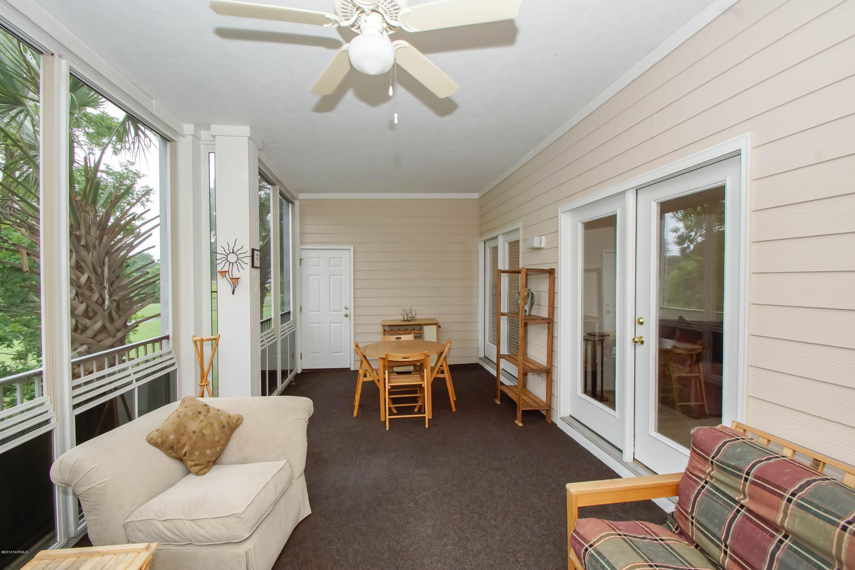 186 Clubhouse Road, Unit 3 Sunset Beach, NC 28468 - Photo 17 of 35 Screen Porch