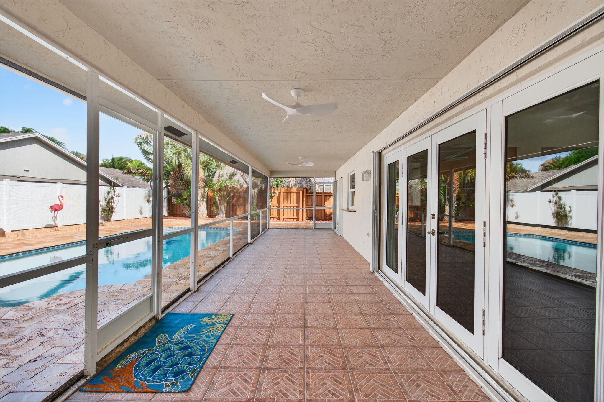 17350 Springtree Lane Boca Raton, FL 33487 - Photo 56 of 83 a view of a large room with wooden floor