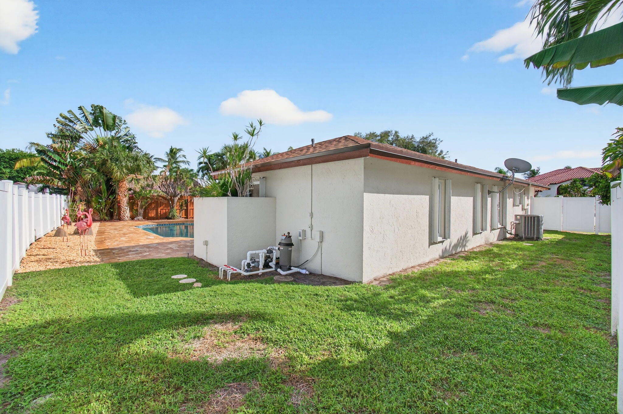 17350 Springtree Lane Boca Raton, FL 33487 - Photo 62 of 83 a view of a back yard of the house