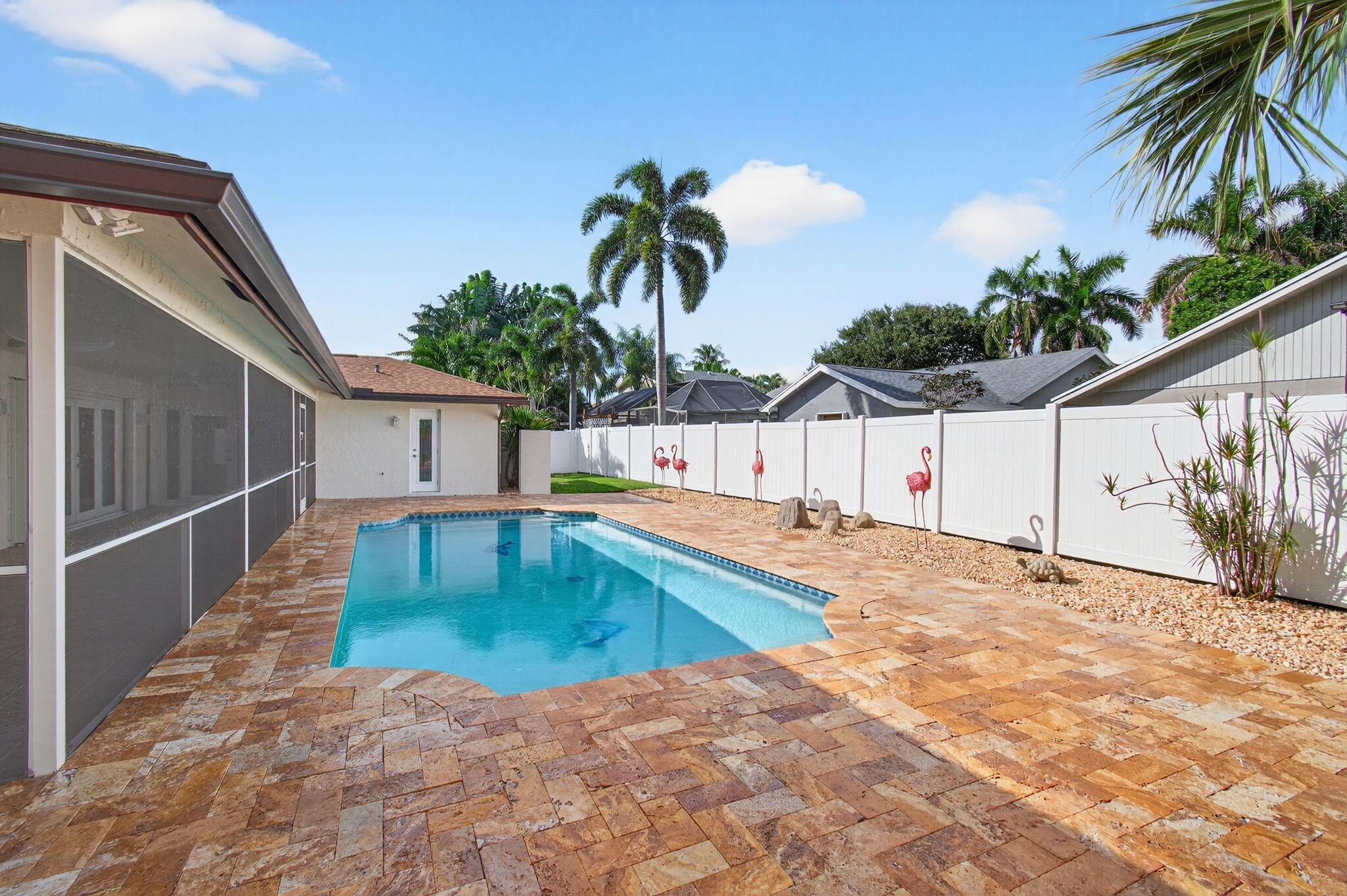 17350 Springtree Lane Boca Raton, FL 33487 - Photo 64 of 83 a swimming pool with palm tree