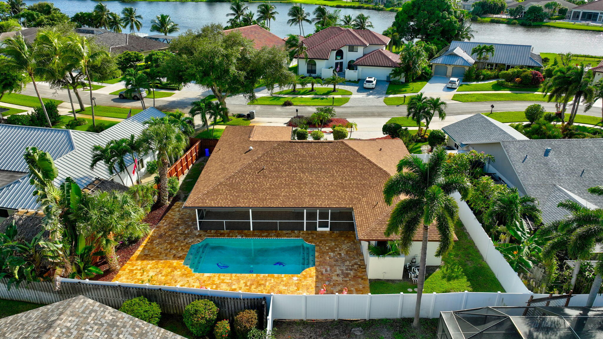 17350 Springtree Lane Boca Raton, FL 33487 - Photo 81 of 83 an aerial view of a house with swimming pool and outdoor seating