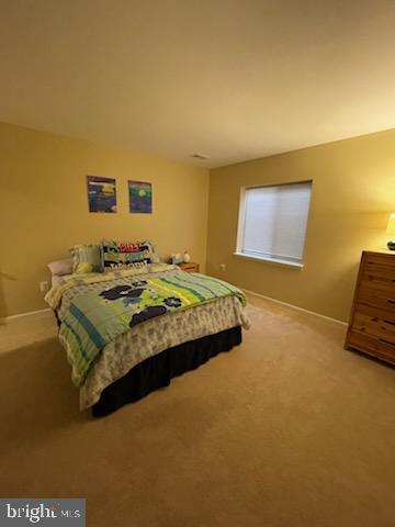 128 Sparkling Brook Road Ranson, WV 25438 - Photo 30 of 57 Cozy bedroom with warm hues.