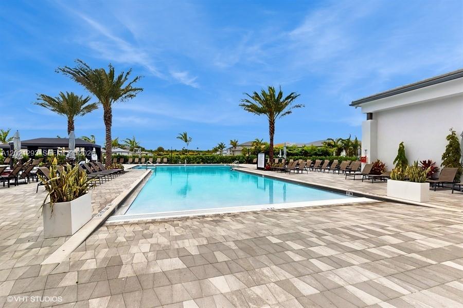8350 Royal County Down Road Boca Raton, FL 33434 - Photo 40 of 52 a view of swimming pool with outdoor seating
