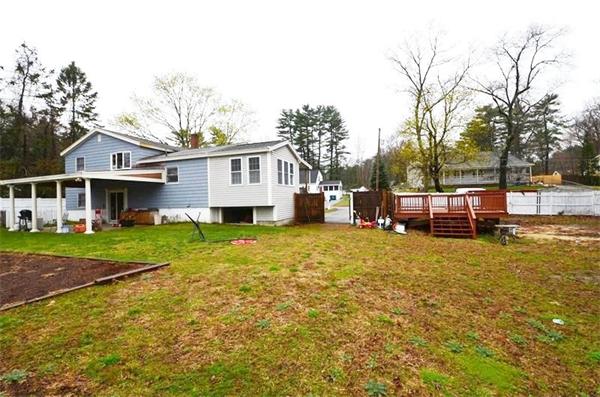 8 Riverside Road Billerica, MA 01821 - Photo 26 of 30 a view of a house with backyard and sitting area