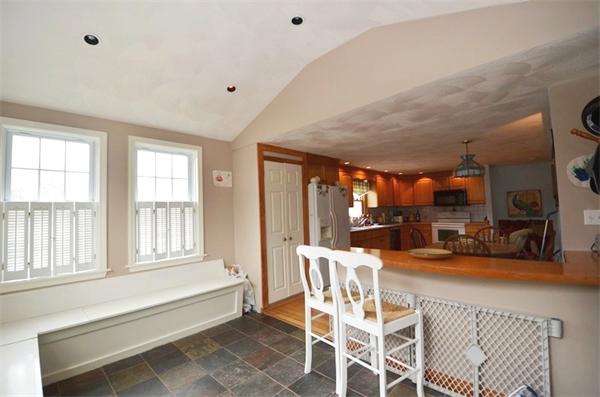 8 Riverside Road Billerica, MA 01821 - Photo 10 of 30 a dining room with furniture and a large window