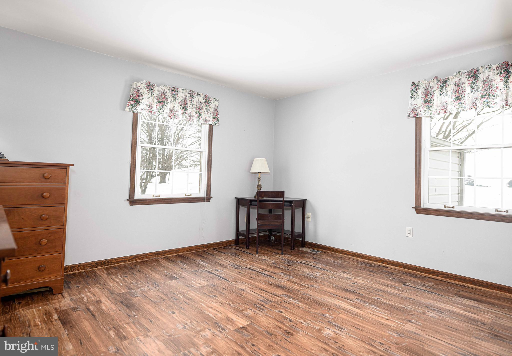 754 Main Street Fawn Grove, PA 17321 - Photo 15 of 40 a view of room window and wooden floor