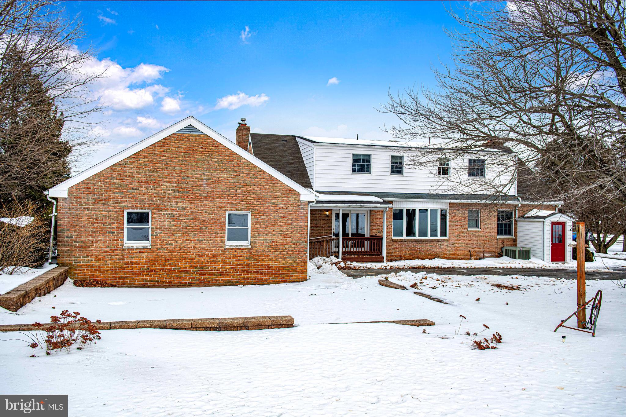 754 Main Street Fawn Grove, PA 17321 - Photo 30 of 40 a front view of a house with a yard