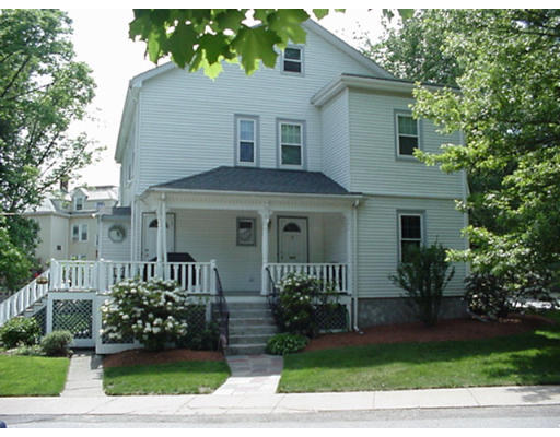 26 Marion Road, Unit B Watertown, MA 02472 - Photo 1 of 10 a front view of a house with a garden