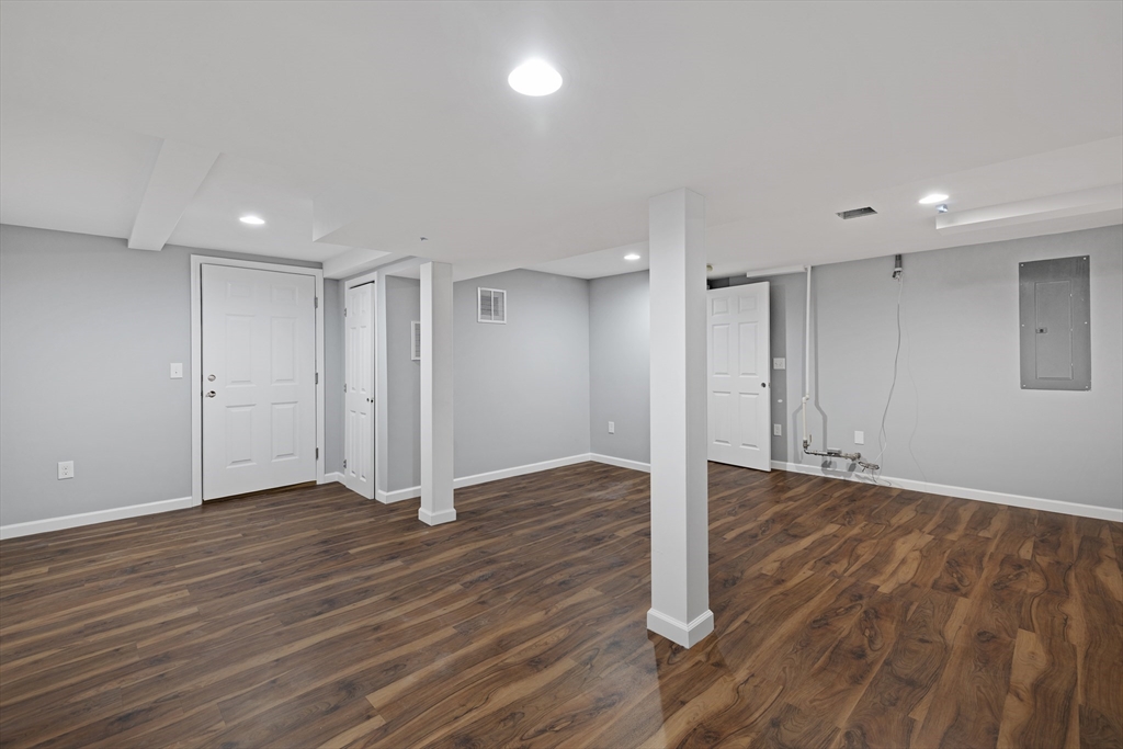 132 Kibbe Road East Longmeadow, MA 01028 - Photo 30 of 32 a view of an empty room with wooden floor
