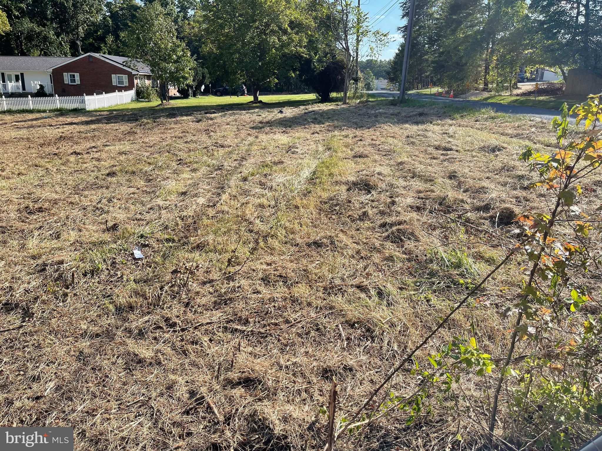 624 Trimble Road Joppa, MD 21085 - Photo 2 of 7 a backyard of a house with large trees