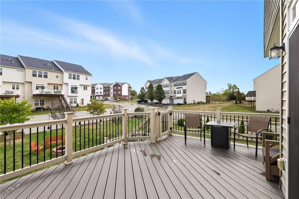 11 Truman Circle McKees Rocks, PA 15136 - Photo 16 of 33 a view of a balcony with wooden floor and fence
