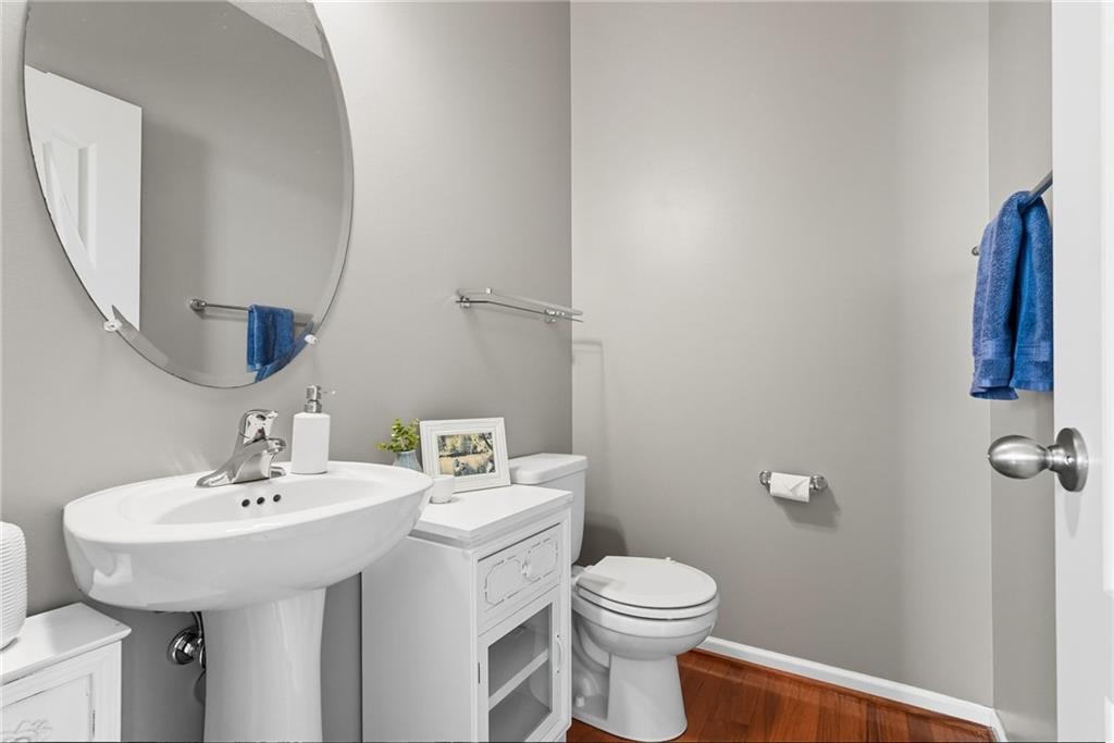 11 Truman Circle McKees Rocks, PA 15136 - Photo 19 of 33 a bathroom with a sink toilet and mirror