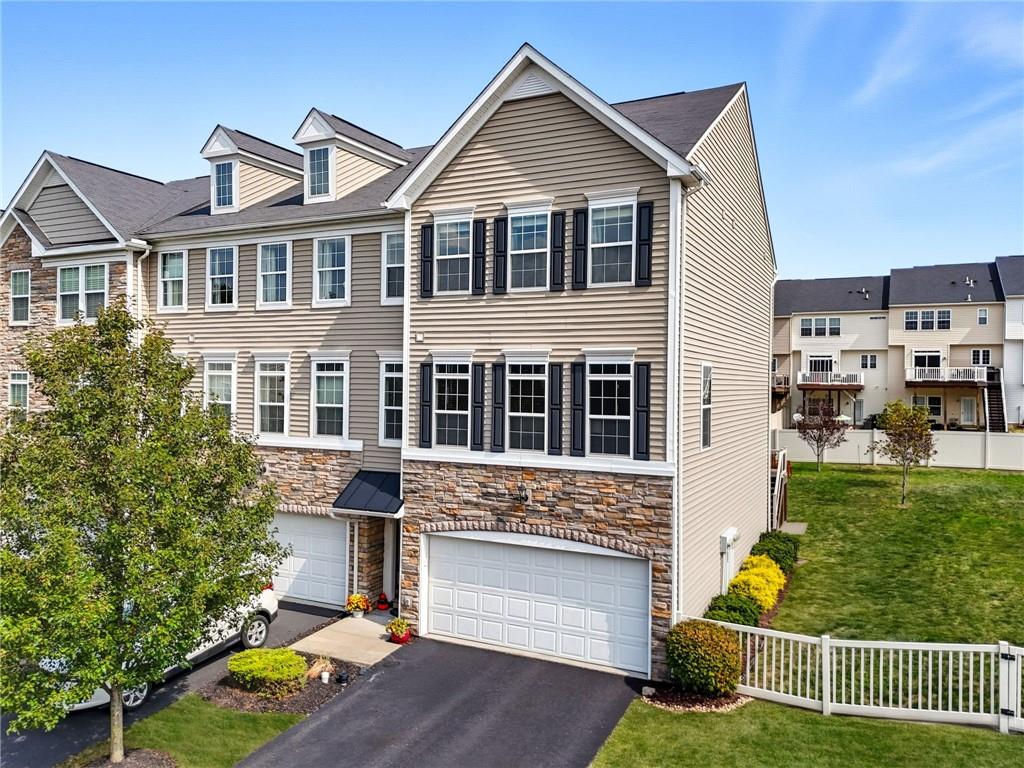 11 Truman Circle McKees Rocks, PA 15136 - Photo 2 of 33 a front view of a house with a yard