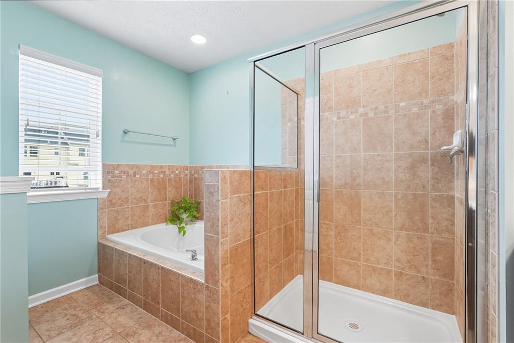 11 Truman Circle McKees Rocks, PA 15136 - Photo 22 of 33 a bathroom with a bathtub and a shower