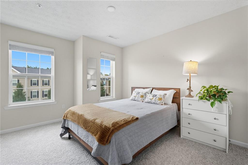 11 Truman Circle McKees Rocks, PA 15136 - Photo 26 of 33 a bedroom with a bed and a window