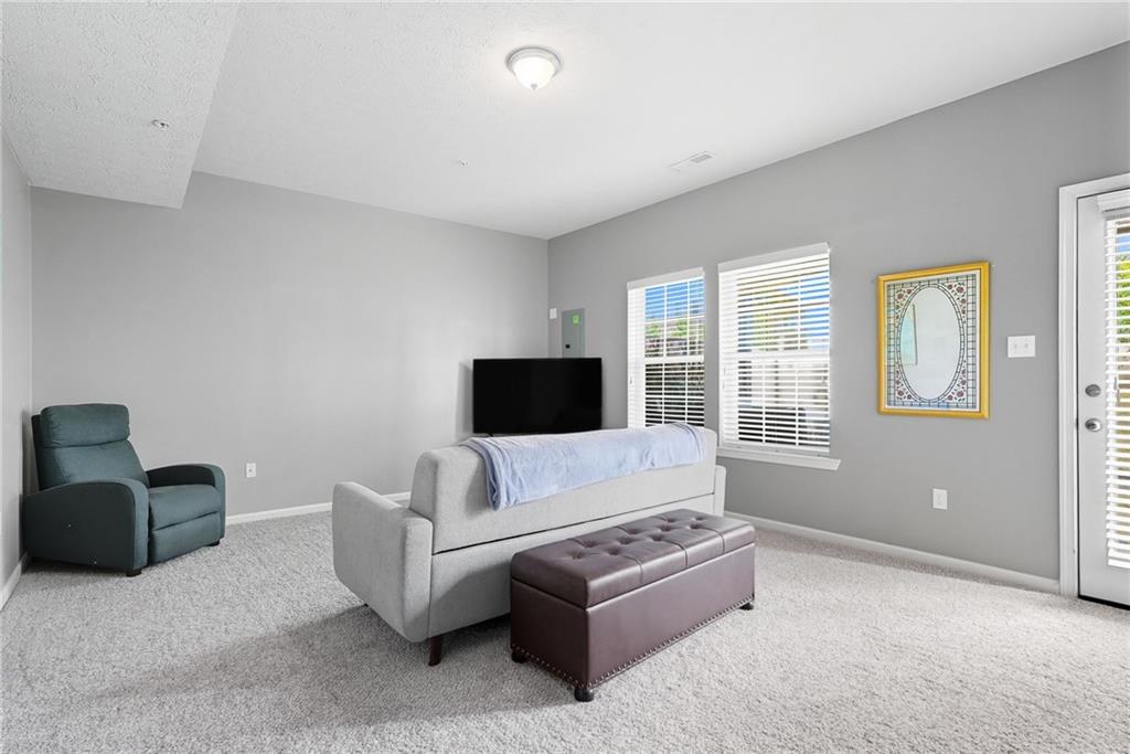 11 Truman Circle McKees Rocks, PA 15136 - Photo 30 of 33 a living room with furniture and a flat screen tv