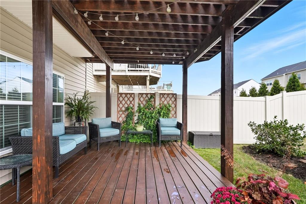 11 Truman Circle McKees Rocks, PA 15136 - Photo 31 of 33 a porch with seating space and potted plants