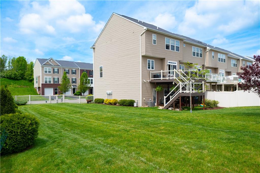 11 Truman Circle McKees Rocks, PA 15136 - Photo 32 of 33 a front view of a house with a garden