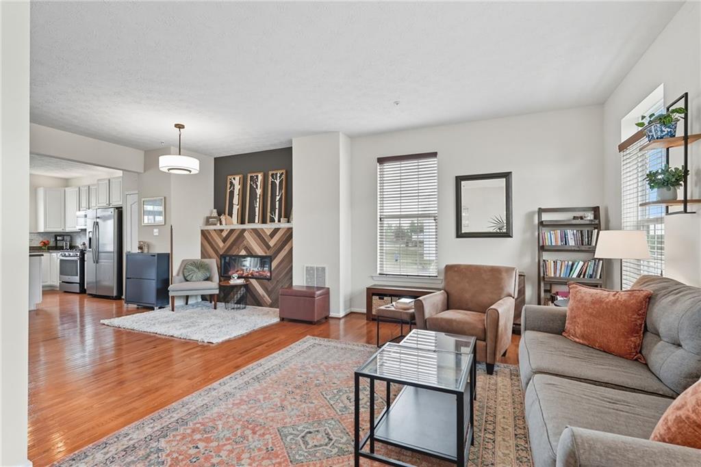 11 Truman Circle McKees Rocks, PA 15136 - Photo 4 of 33 a living room with furniture and a wooden floor