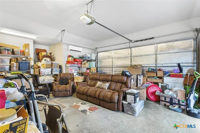 a living room with lots of furniture