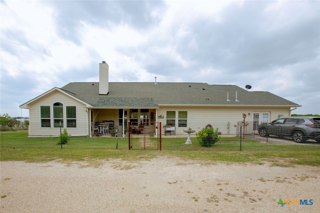 187 Tracks Trail Center Point, TX 78010 - Photo 37 of 41 a front view of a house with garden