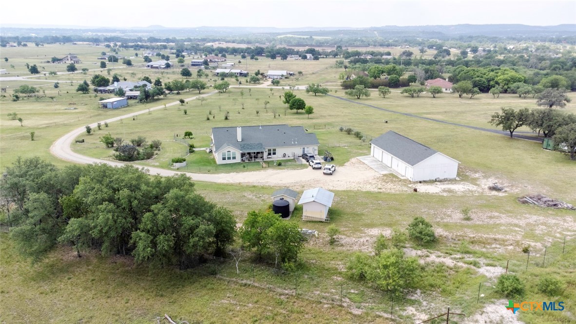 187 Tracks Trail Center Point, TX 78010 - Photo 39 of 41 an aerial view of residential houses with outdoor space and swimming pool