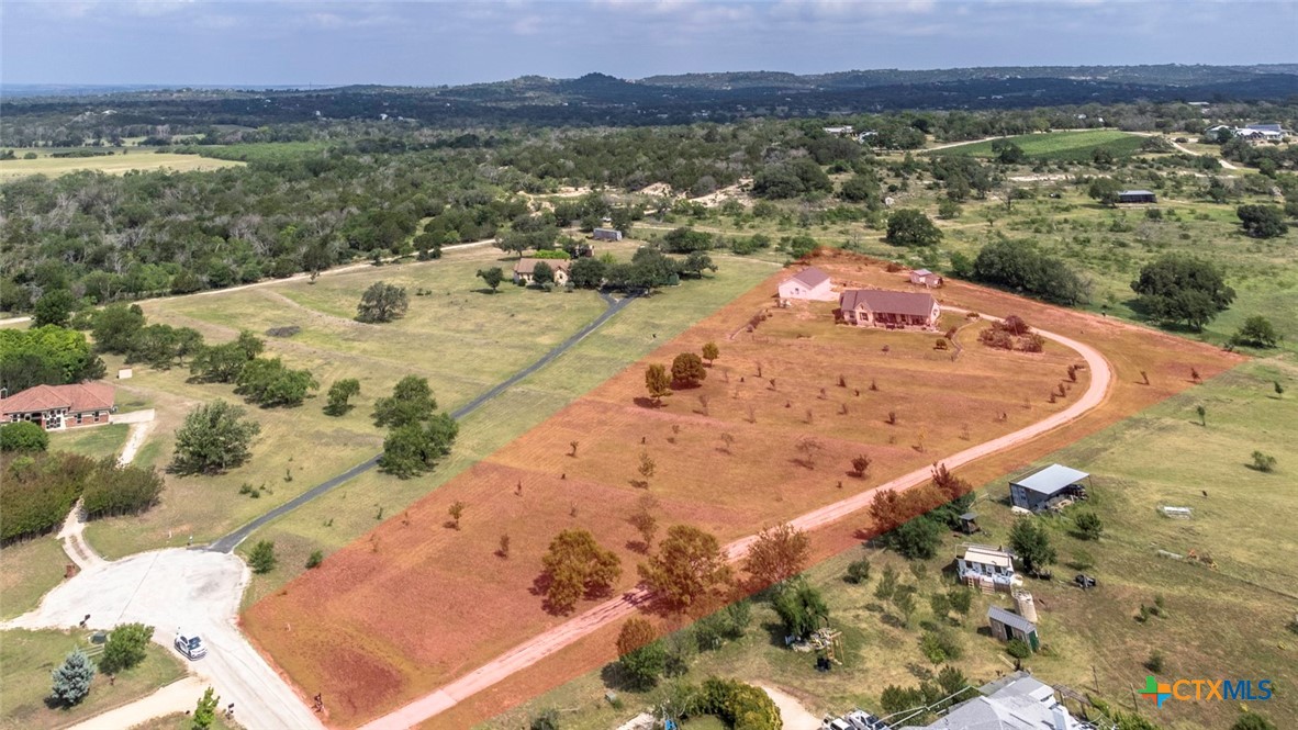 187 Tracks Trail Center Point, TX 78010 - Photo 41 of 41 a view of a lake with a mountain