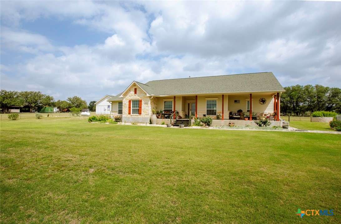 187 Tracks Trail Center Point, TX 78010 - Photo 6 of 41 a front view of house with an outdoor space and seating
