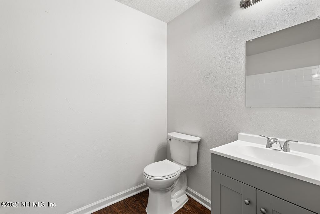 3701 Stuart Street Jacksonville, FL 32209 - Photo 21 of 24 a white toilet sitting next to a white sink