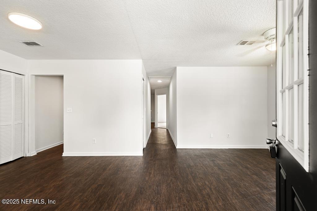 3701 Stuart Street Jacksonville, FL 32209 - Photo 3 of 24 a view of empty room with wooden floor