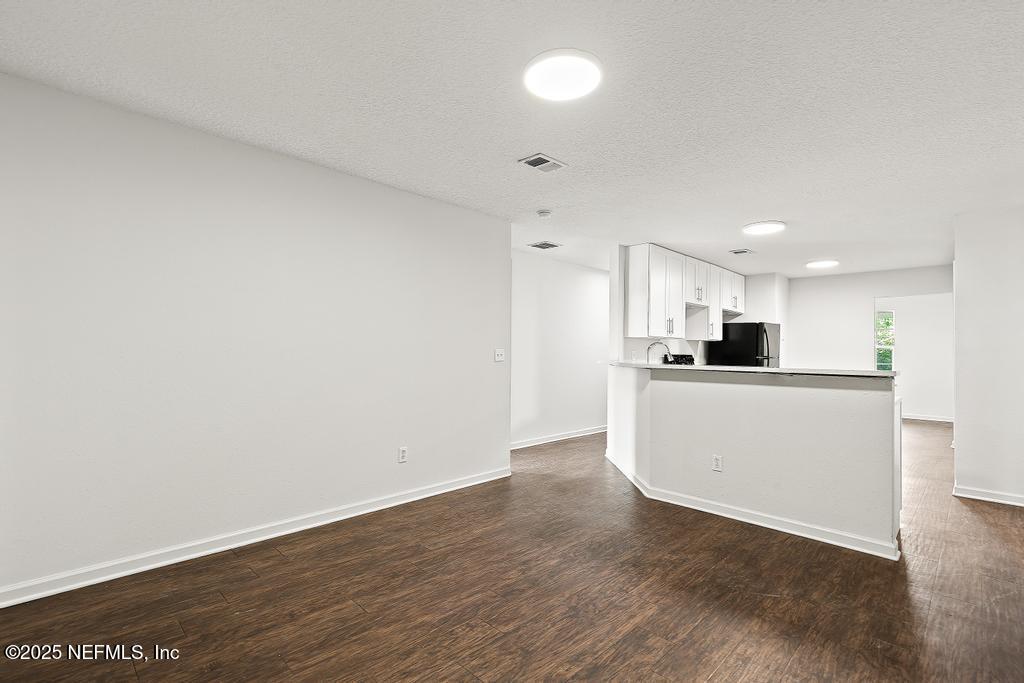 3701 Stuart Street Jacksonville, FL 32209 - Photo 10 of 24 a view of kitchen with wooden floor