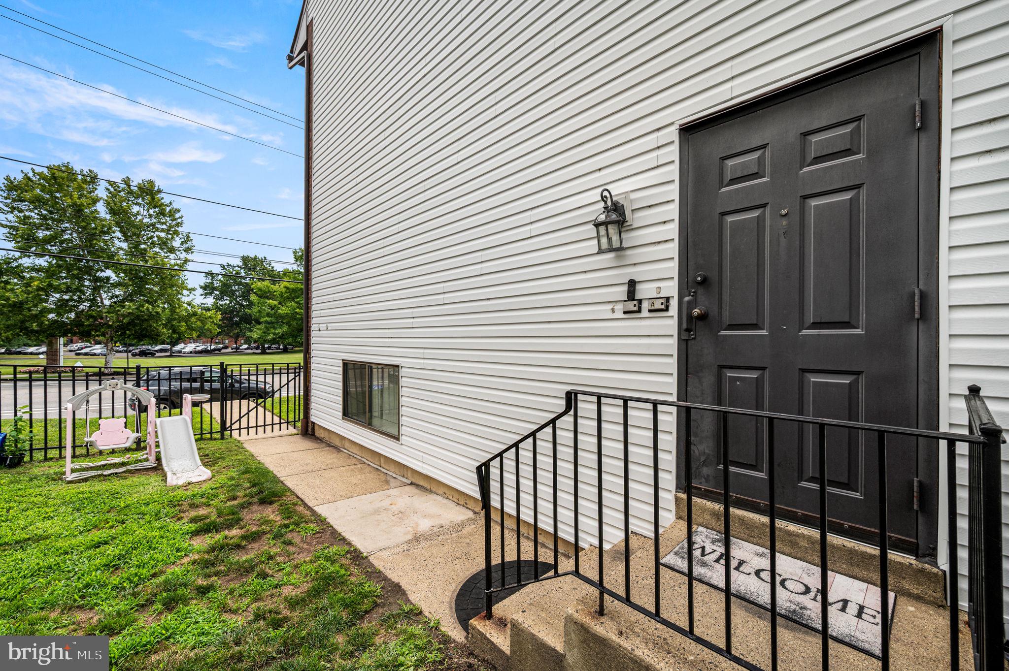 9578 State Rd., Unit A Philadelphia, PA 19114 - Photo 3 of 27 a view of a balcony with two chairs
