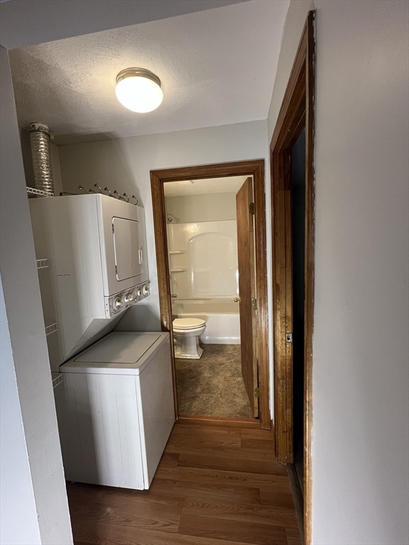 35 School Street, Unit 7 Dracut, MA 01826 - Photo 12 of 22 a kitchen with a refrigerator and a stove