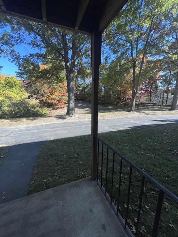 35 School Street, Unit 7 Dracut, MA 01826 - Photo 22 of 22 a view of a yard with wooden fence