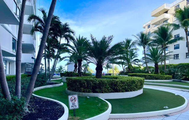 a spacious bathroom with a double vanity sink and a mirror