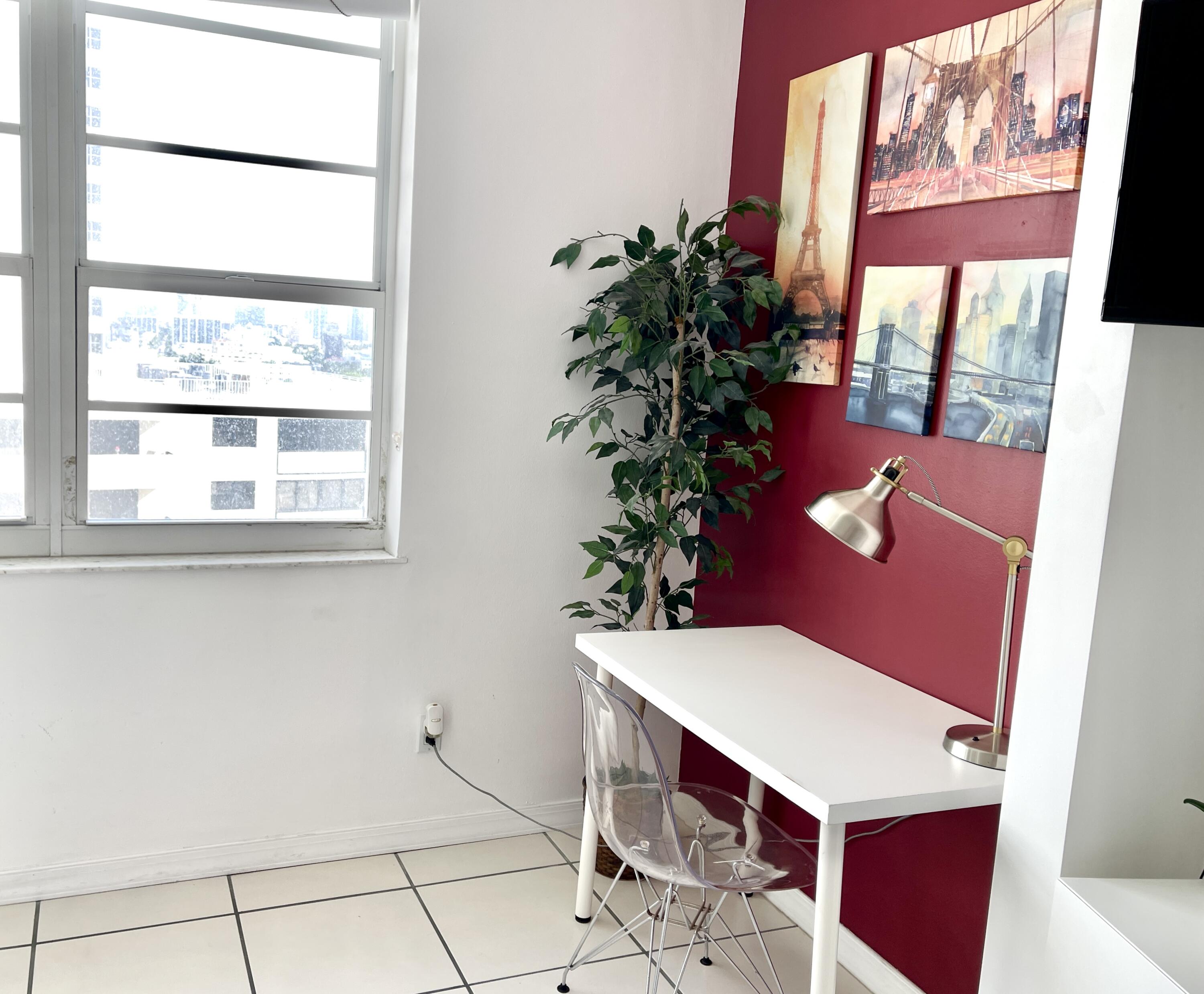 100 Lincoln Road, Unit 1105 Miami Beach, FL 33139 - Photo 23 of 30 a room with furniture and a potted plant