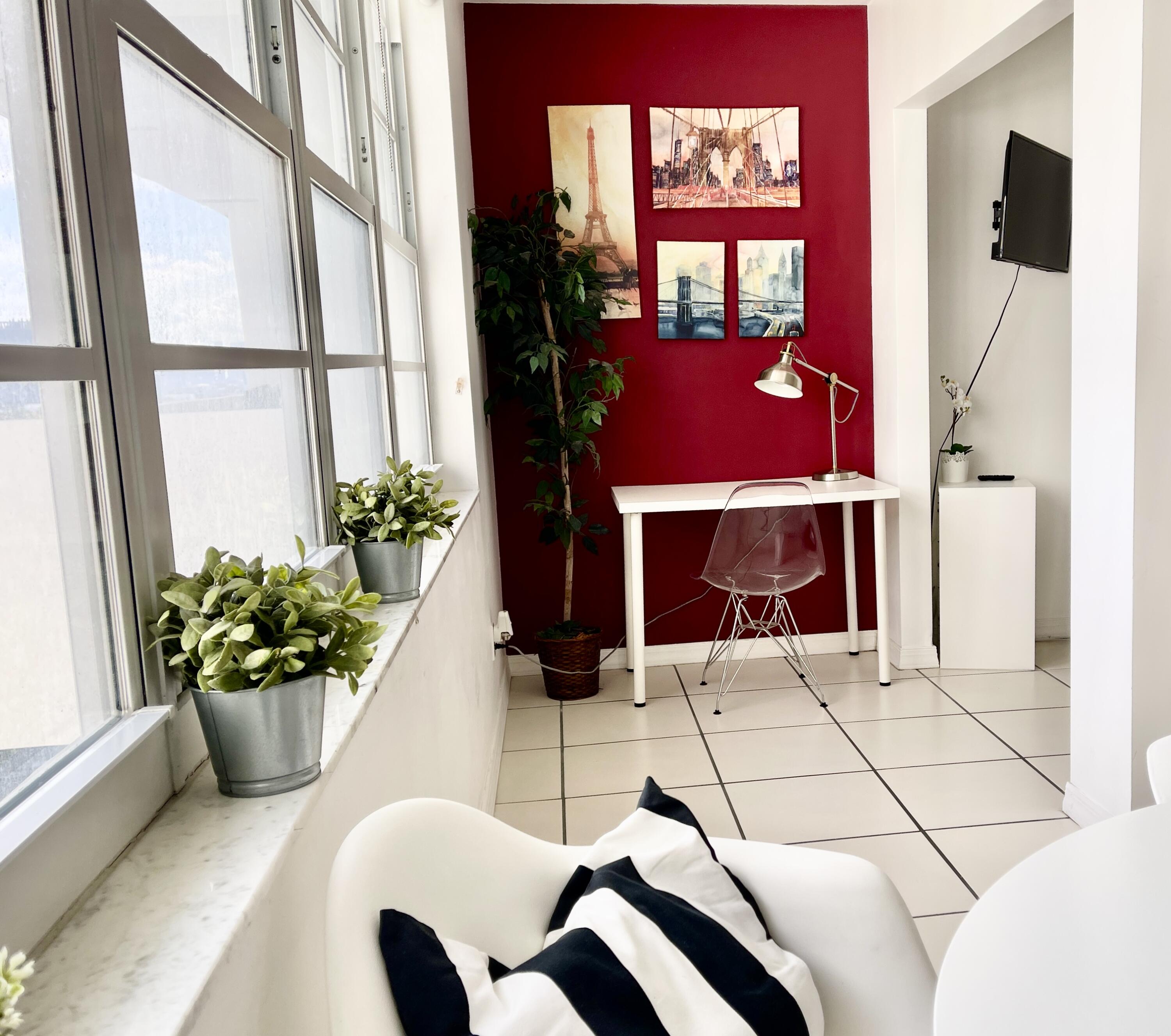 100 Lincoln Road, Unit 1105 Miami Beach, FL 33139 - Photo 24 of 30 a dining room with furniture and window