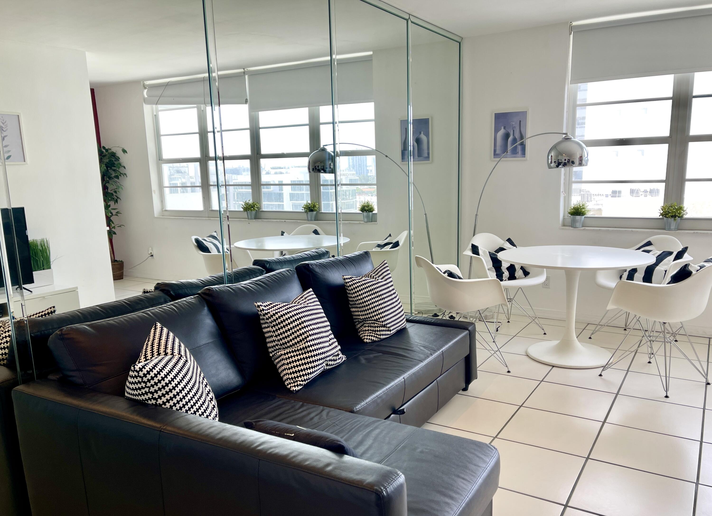 100 Lincoln Road, Unit 1105 Miami Beach, FL 33139 - Photo 27 of 30 a living room with furniture and a window