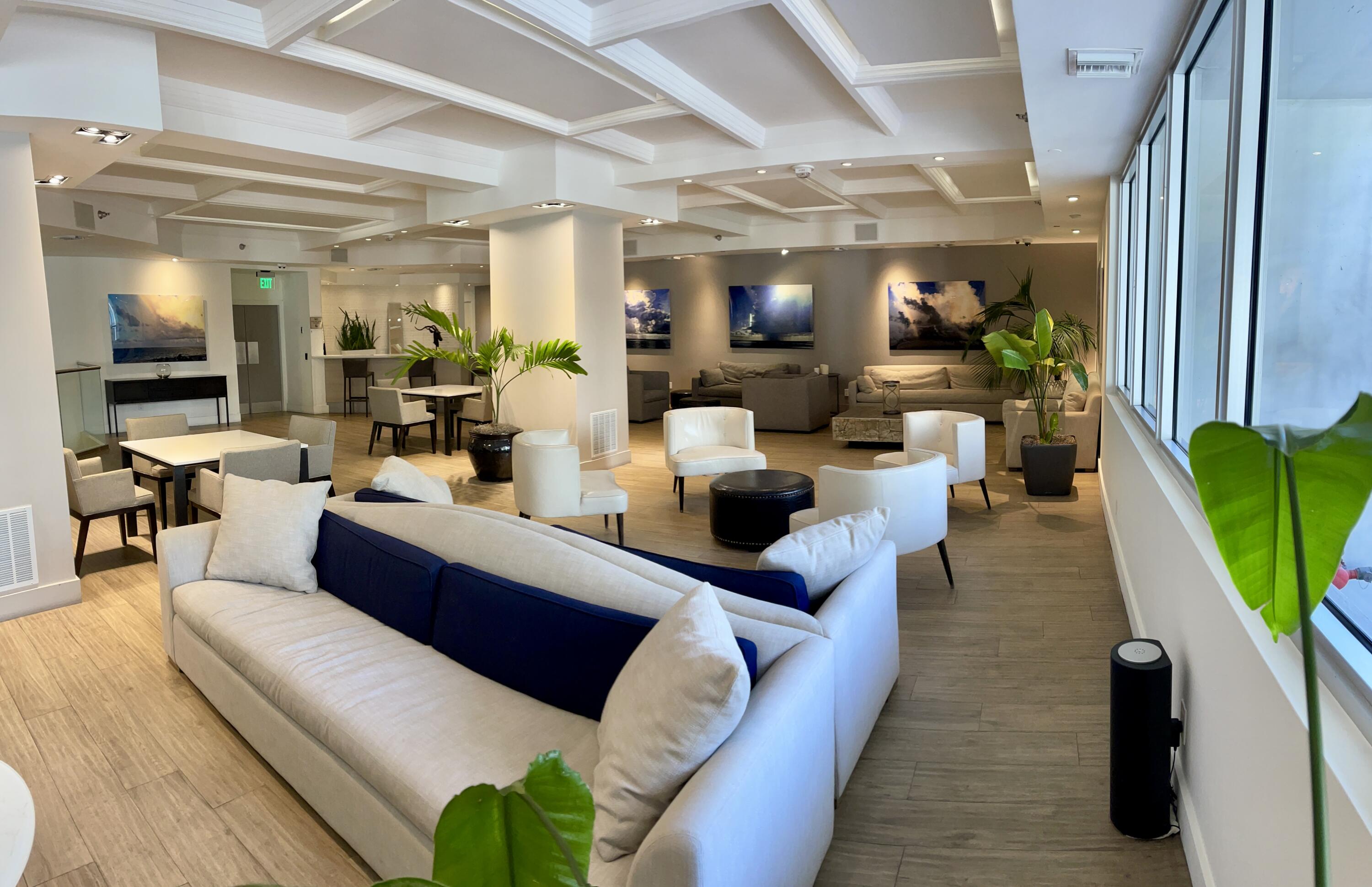 100 Lincoln Road, Unit 1105 Miami Beach, FL 33139 - Photo 7 of 30 a living room with furniture and a flat screen tv