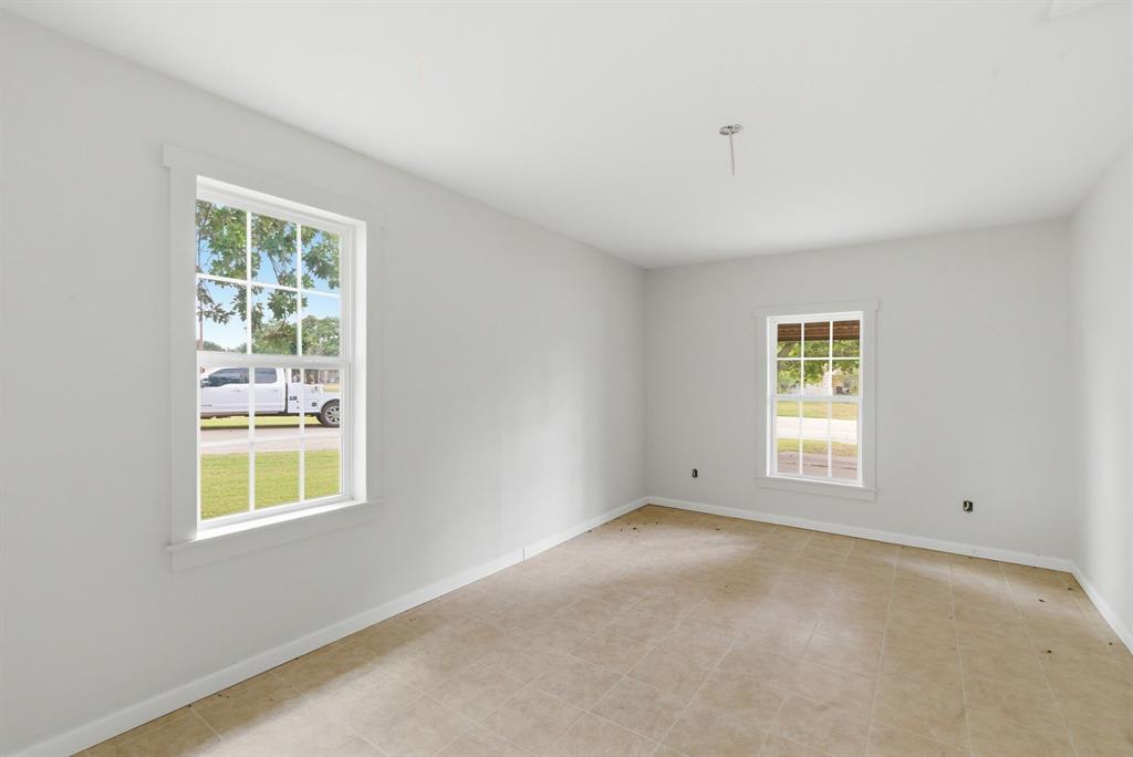 203 North Kickapoo Street Lipan, TX 76462 - Photo 6 of 28 a view of a room with windows