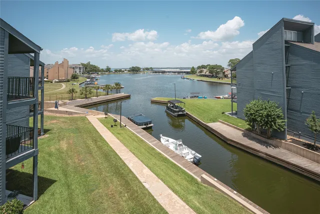 a view of a lake with a city