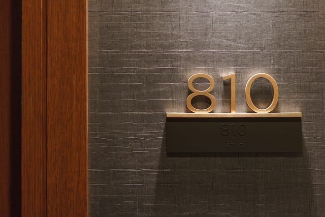 a view of balcony and car parked
