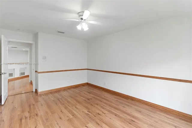 a bathroom with a shower sink vanity and bathtub