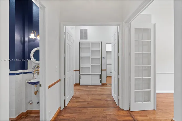 a bathroom with a tub sink and shower