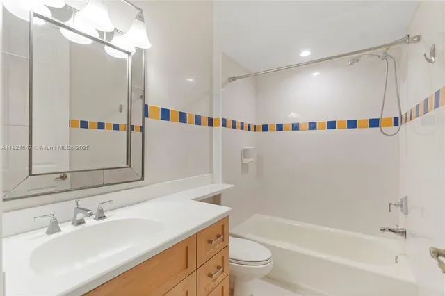 a view of swimming pool with outdoor seating and plants