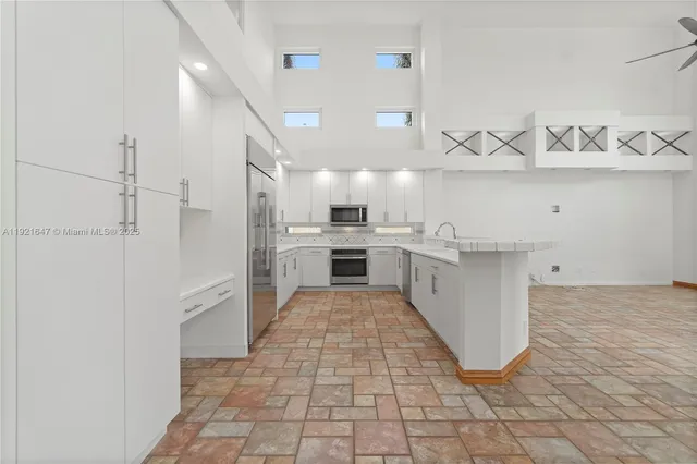 a view of a lake with a big yard